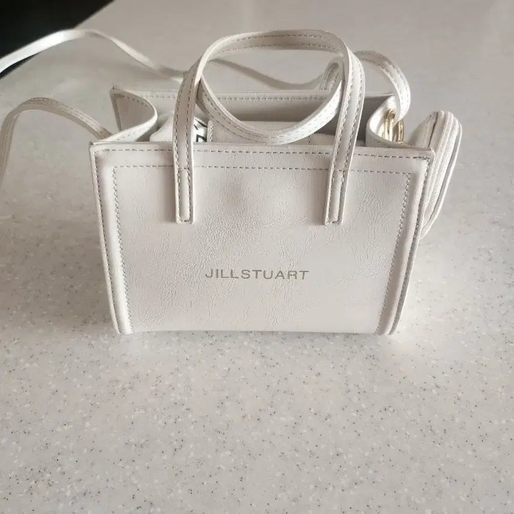 [BUNJANG] Jill Stuart White Mini Bag with Charm / 질스튜어트크로스가방
