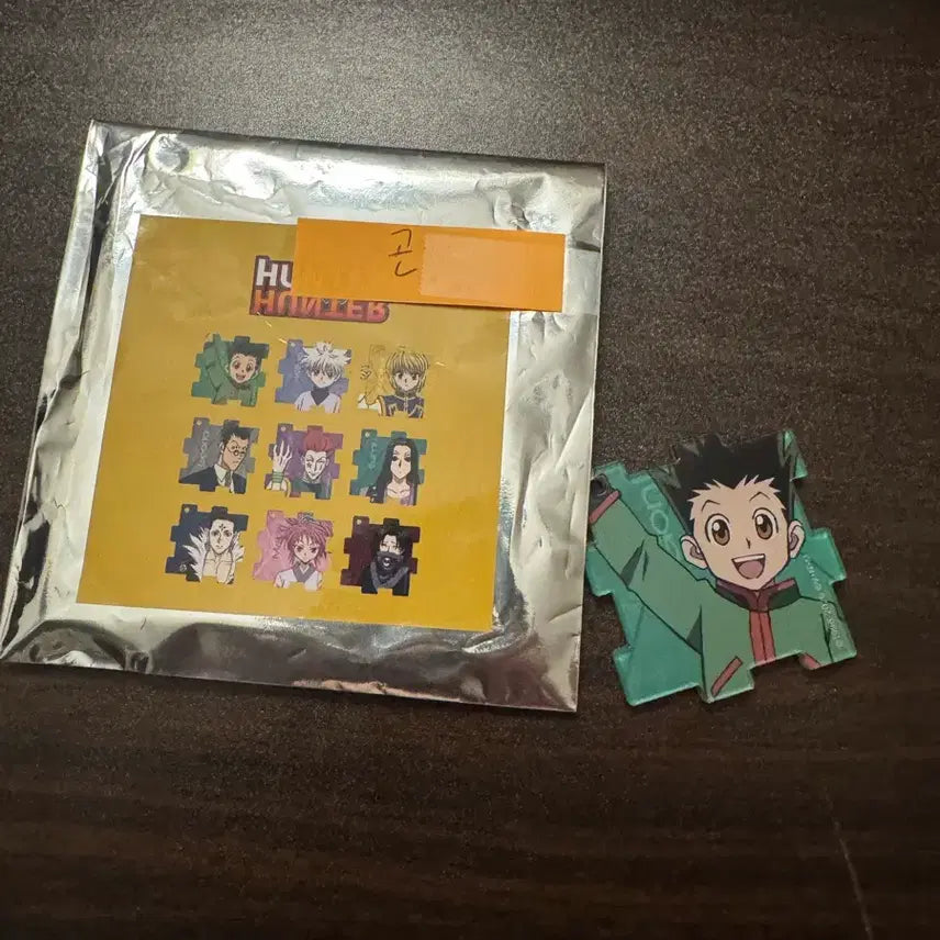 [SOLD OUT] 헌터헌터 애니플러스 카페 콜라보 퍼즐키링 곤 판매합니다