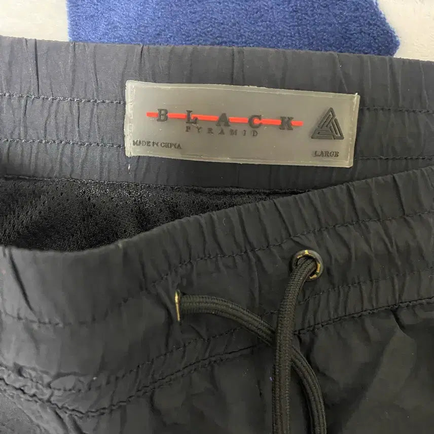 [BUNJANG] Black Pyramid Woven Pants / 블랙 피라미드 우븐 팬츠