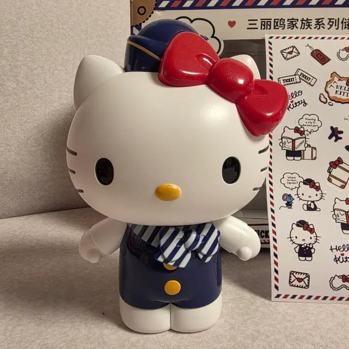 [SOLD OUT] 선물가능! 새상품) 헬로키티 승무원 저금통 피규어 스티커 세트 태닝키티