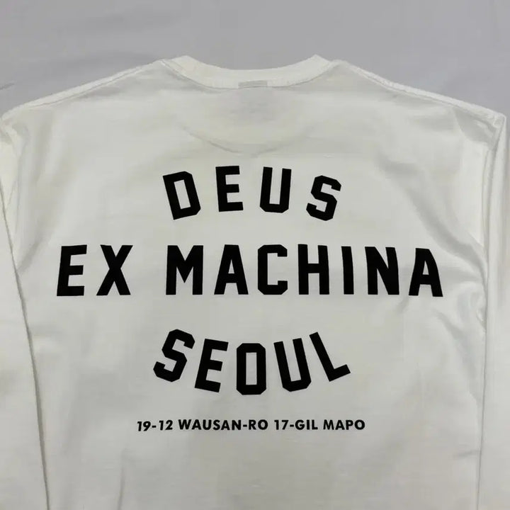 [BUNJANG] Deus Seoul College Long Sleeve White T-shirt / [새상품]Deus데우스 서울 컬리지 긴팔 롱슬리브 화이트 M