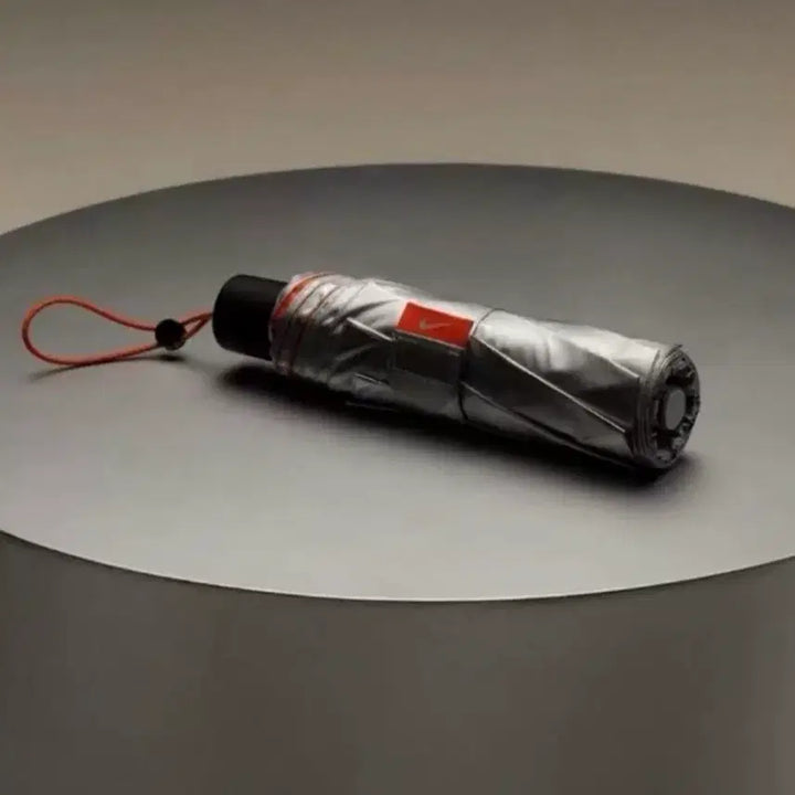 [BUNJANG] Nike Folding Umbrella Limited Edition Set with Dust Bag - Silver/Orange / 나이키 접이식 우산 리미티드 방수 더스트백 세트 실버 오렌지