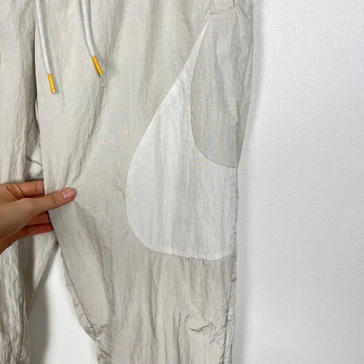 [BUNJANG] Nike Beige Windbreaker Training Pants Men&