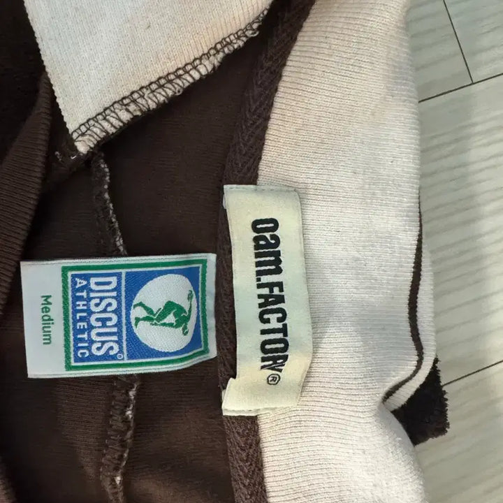 [BUNJANG] Oam Factory Discuss Brown Collaboration T-shirt / Oam 팩토리 디스커스 브라운 콜라보 반팔