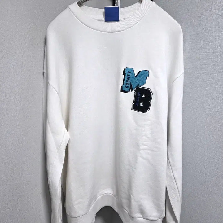 [BUNJANG] Marcelo Burlon Emblem Patch Sweatshirt / 마르셀로볼론 엠블럼 패치 스웨트셔츠