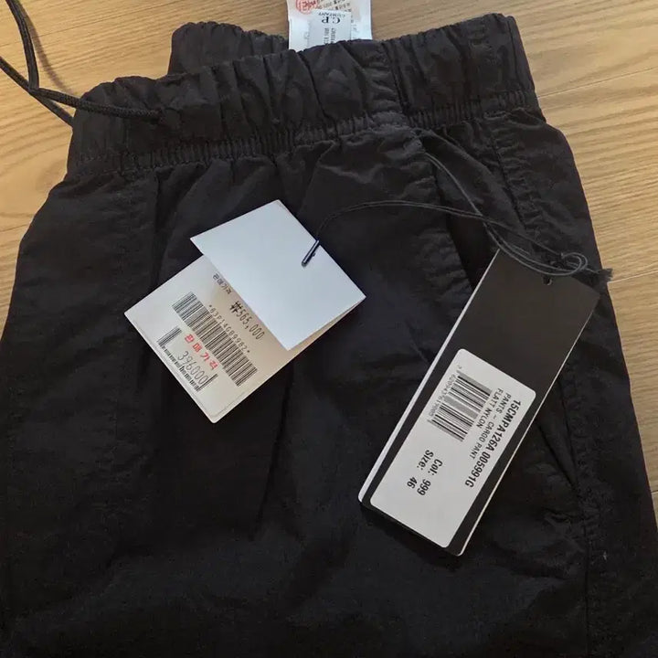 [BUNJANG] CP컴퍼니 FLATT NYLON LENS LOOSE PANTS / CP컴퍼니 FLATT NYLON LENS LOOSE PANTS