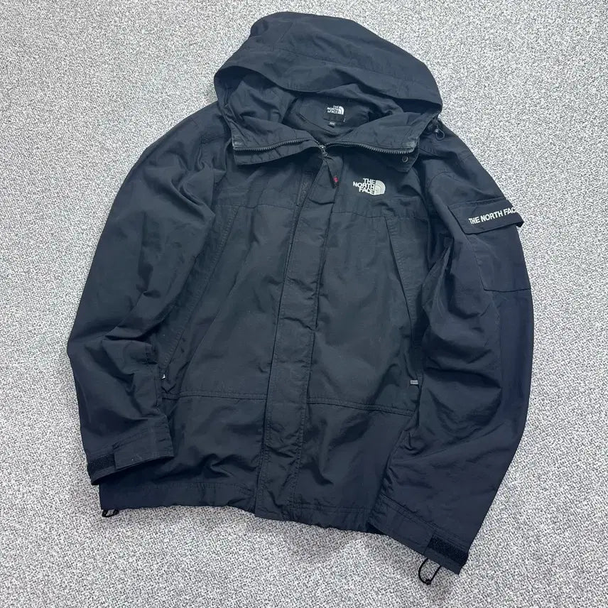 [BUNJANG] The North Face Pocket Logo Windbreaker Black / 노스페이스 포켓 로고 블랙 바람막이