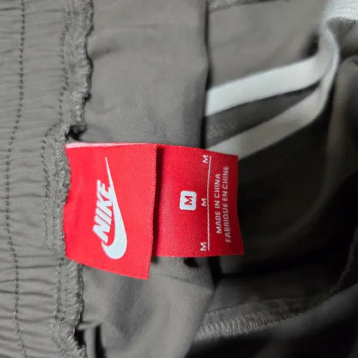 [BUNJANG] Nike AF1 Side Button Track Pants / 나이키 AF1 사이드 버튼 트랙 팬츠