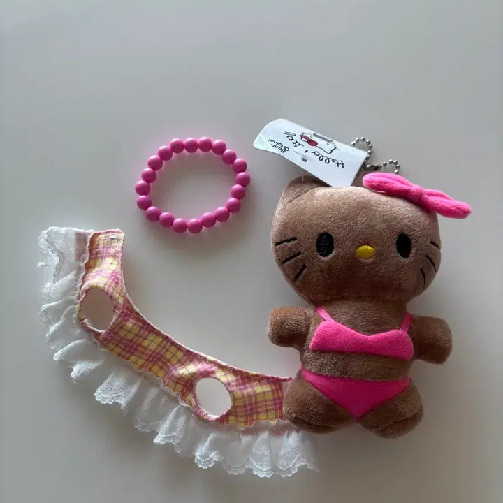 [BUNJANG] Sanrio Hawaii Tanning Kitty Bikini Figure Keychain / 택포 태닝키티 정품 옷탈부착 비키니 하와이키티 키링