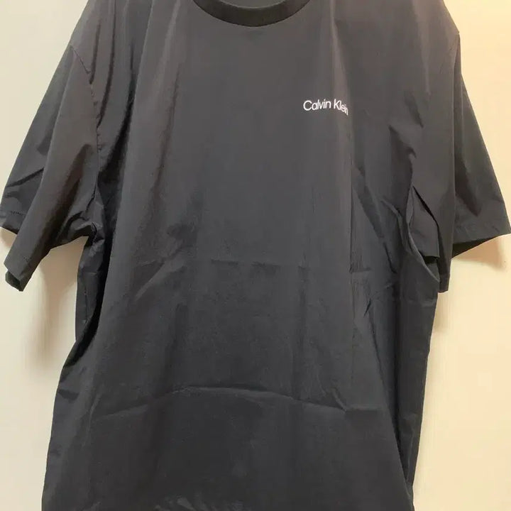 [BUNJANG] Calvin Klein Nylon Woven Short-Sleeve T-Shirt (Black) / 캘빈클라인 스포츠 나일론 우븐 반팔 피스테 유니 (블랙)