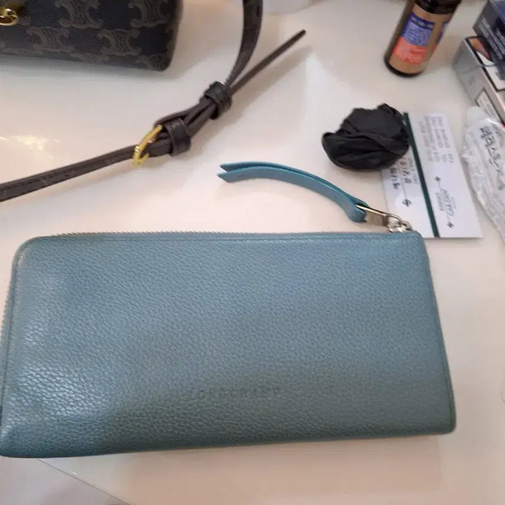 [SOLD OUT] 롱샴 레더 파우치 하늘색