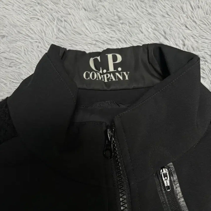 [BUNJANG] CP Company Lens Goggle Knit Padded Jacket / CP컴퍼니 렌즈 와펜 니트 패딩