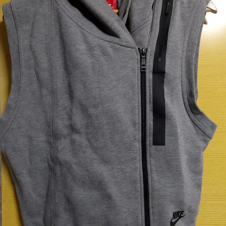 [BUNJANG] Nike Tech Fleece Relaxed Fit Hooded Vest / 나이키 테크팩 여성 후드 조끼 여유핏 M85