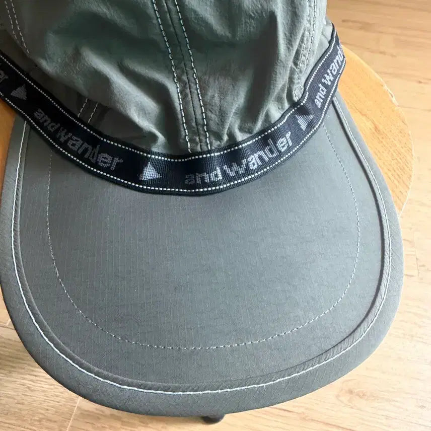[BUNJANG] and wander JQ TAPE Cap Khaki (Original Model) / 앤드원더 JQ TAPE 캡 모자 카키 (초창기 모델)