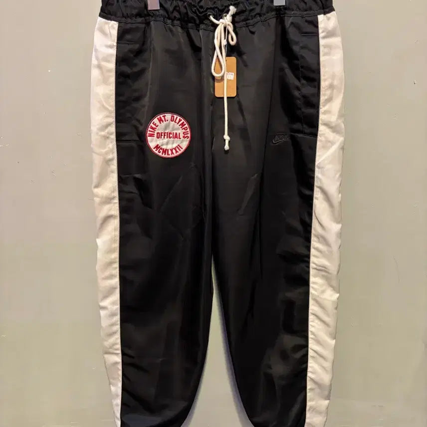[BUNJANG] Nike Limited Edition Striped Woven Wide Jogger Pants / 나이키 한정판 스트라이프 우븐 와이드조거팬츠