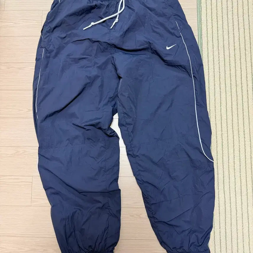 [SOLD OUT] 나이키 솔로 스우시 트랙 팬츠 썬더 블루 화이트
