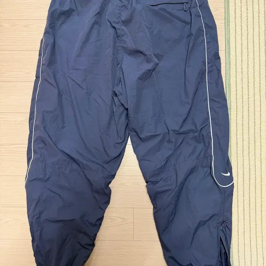 [SOLD OUT] 나이키 솔로 스우시 트랙 팬츠 썬더 블루 화이트
