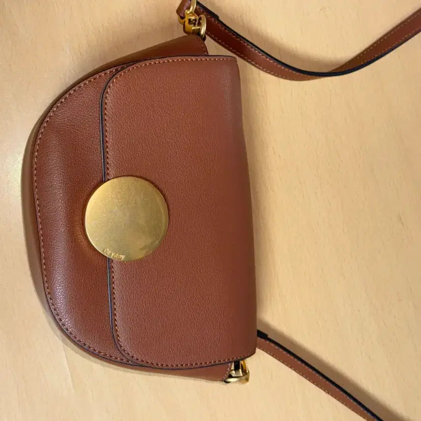 [BUNJANG] Oryany Rothy Saddle Crossbody Bag / 오야니 브라운 크로스백 (로티 새들 크로스바디)