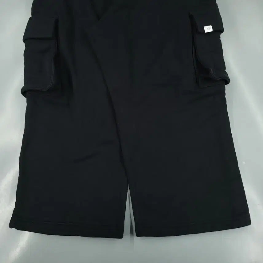 [BUNJANG] Nike Black White Swoosh Logo Wide-Fit Sweatpants / 나이키 블랙 화이트 스우시 로고 밴딩 카고포켓 와이드핏 스웻팬츠 트레이닝