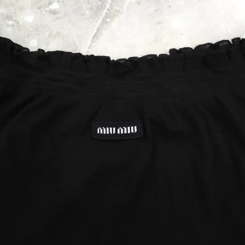 [SOLD OUT] XS / 미우미우 리브드 니트 저지 스커트 블랙 MJD192
