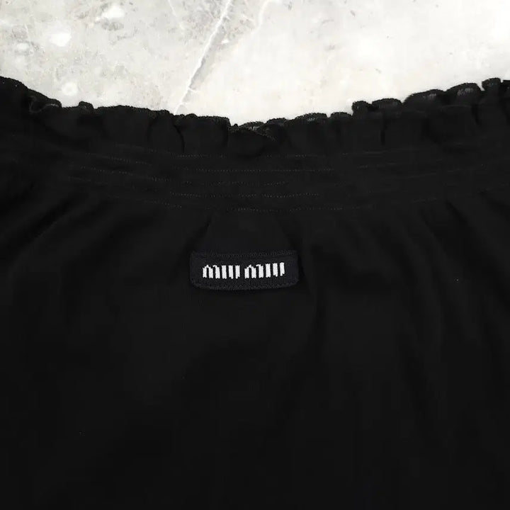 [SOLD OUT] XS / 미우미우 리브드 니트 저지 스커트 블랙 MJD192