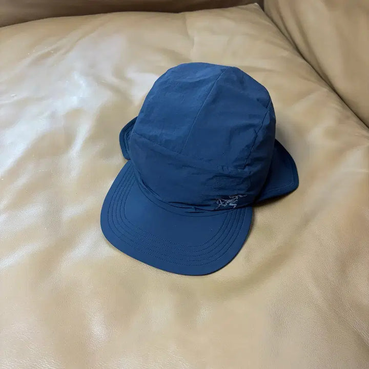 [BUNJANG] Arcteryx Proton Two-Way Camp Cap with Ear Flap Black / Arcteryx 아크테릭스 프로톤 투웨이 햇 캠프캡 이어플랩 모자 블랙