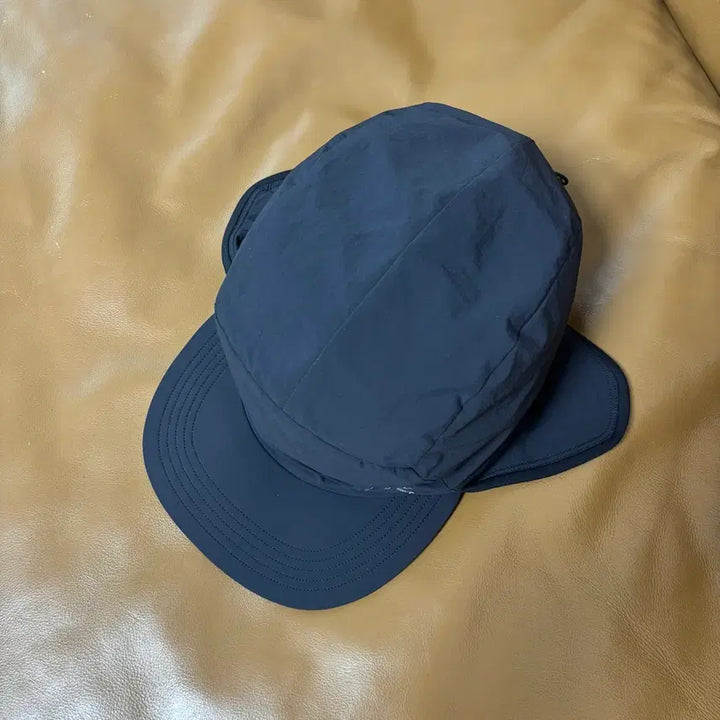 [BUNJANG] Arcteryx Proton Two-Way Camp Cap with Ear Flap Black / Arcteryx 아크테릭스 프로톤 투웨이 햇 캠프캡 이어플랩 모자 블랙