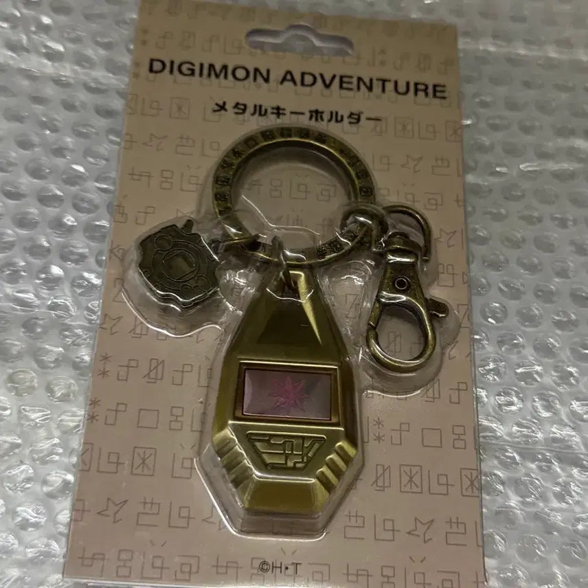 [SOLD OUT] [미개봉] 디지몬어드벤처 히카리 신나리 빛의 문장 메탈 키링 키홀더