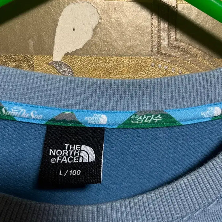 [BUNJANG] The North Face x Samdasoo Collaboration Sky Blue Sweatshirt / [ 노스페이스X삼다수 콜라보 맨투맨 L/100 ]