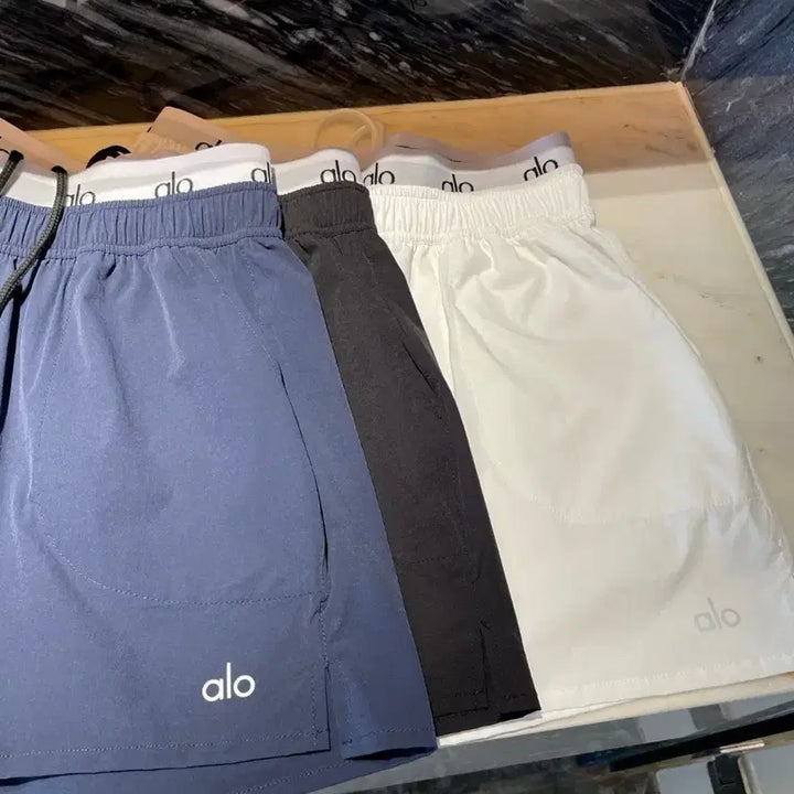 [BUNJANG] Alo Yoga Bounding Logo Crinkle Shorts / 알로 aloyoga 밴딩 로고 바스락 반바지 [새상품]