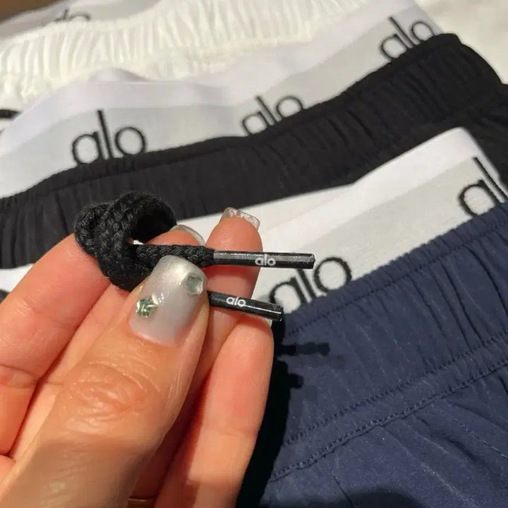 [BUNJANG] Alo Yoga Bounding Logo Crinkle Shorts / 알로 aloyoga 밴딩 로고 바스락 반바지 [새상품]