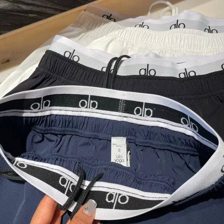 [BUNJANG] Alo Yoga Bounding Logo Crinkle Shorts / 알로 aloyoga 밴딩 로고 바스락 반바지 [새상품]