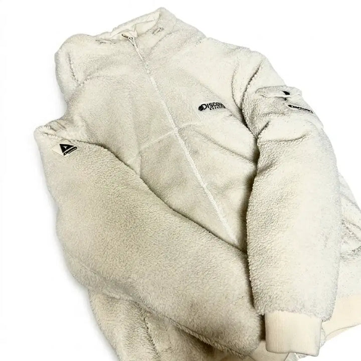 [SOLD OUT] 디스커버리 케이드 플리스 다운 점퍼 크림색상 100