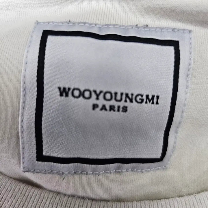 [BUNJANG] WOOYOUNGMI White Logo Long Sleeve T-Shirt - Ivory / 우영미(WOOYOUNGMI) 백로고 롱슬리브 티셔츠 - 화이트/아이보리