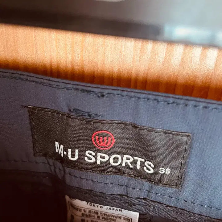 [BUNJANG] M.U Sports Navy Character Shorts / M.U SPORTS 캐릭터 반바지 네이비 엠유 반바지