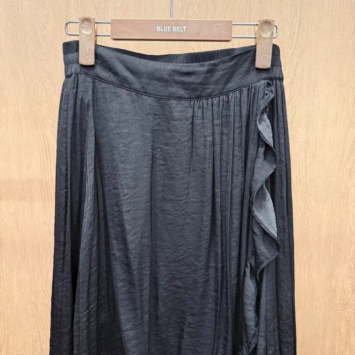 [BUNJANG] Maje Asymmetrical Wrap Long Skirt with Frill Detail - Black / 마쥬 언발란스 랩스타일 밴딩 롱 스커트 프릴 레이어드 디테일 블랙