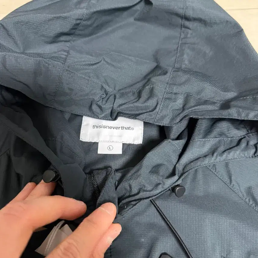 [BUNJANG] thisisneverthat PERTEX QA Windbreaker Washed Black / [L] 디스이즈네버댓 퍼텍스 QA 윈드브레이커 워시드 블랙