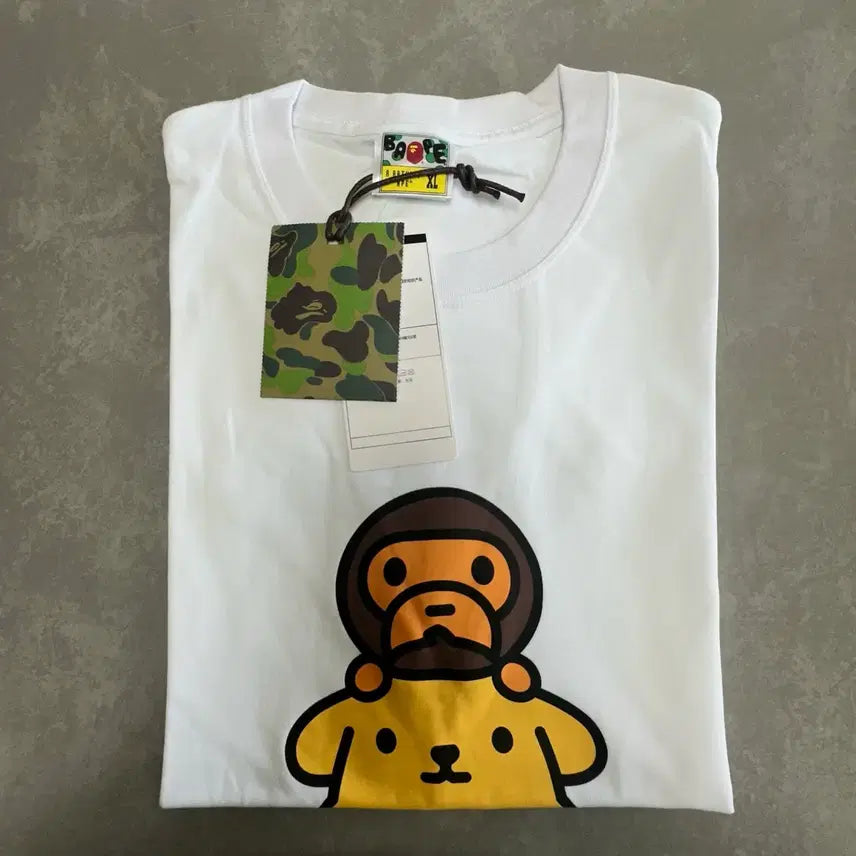 [SOLD OUT] 베이프 베이비 마일로 x 폼폼푸린 티셔츠 화이트 [XL]