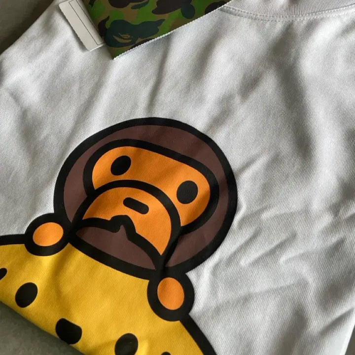[SOLD OUT] 베이프 베이비 마일로 x 폼폼푸린 티셔츠 화이트 [XL]