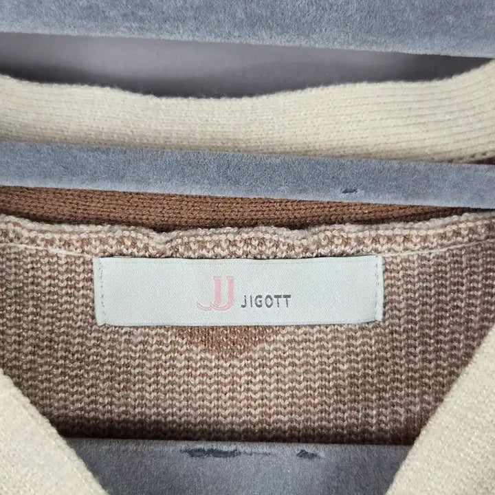 [SOLD OUT] [무료배송]JJ지코트 F 여성 진주 단추 리본 하트 긴팔 니트