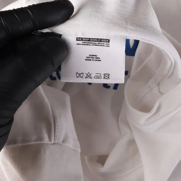 [BUNJANG] NOMANUAL White Back Logo Printed T-shirt L / 노매뉴얼 백로고 프린팅 화이트 반팔티 L