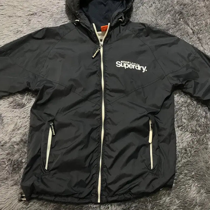 [SOLD OUT] [[L, A급] 슈퍼드라이(SUPER DRY) 포케터블 바람막이