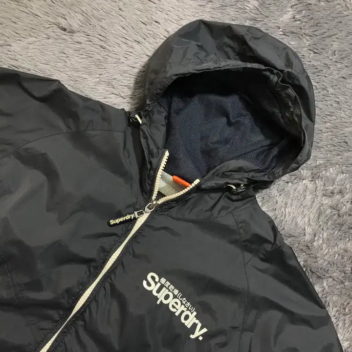 [SOLD OUT] [[L, A급] 슈퍼드라이(SUPER DRY) 포케터블 바람막이