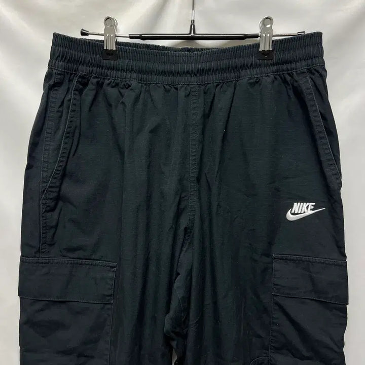 [SOLD OUT] [정품/L] 나이키 스우시 블랙 카고 우븐 포켓 팬츠/바지