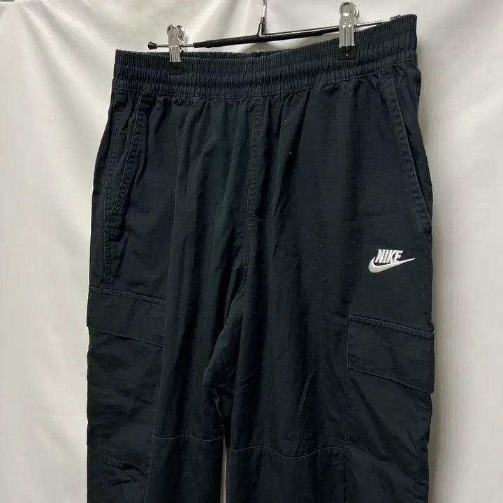 [SOLD OUT] [정품/L] 나이키 스우시 블랙 카고 우븐 포켓 팬츠/바지