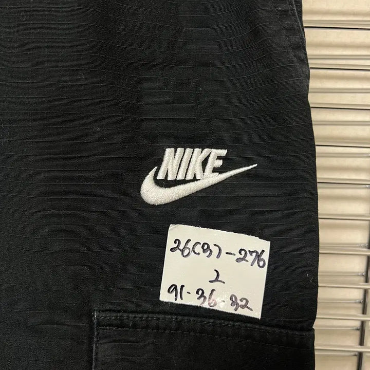 [SOLD OUT] [정품/L] 나이키 스우시 블랙 카고 우븐 포켓 팬츠/바지
