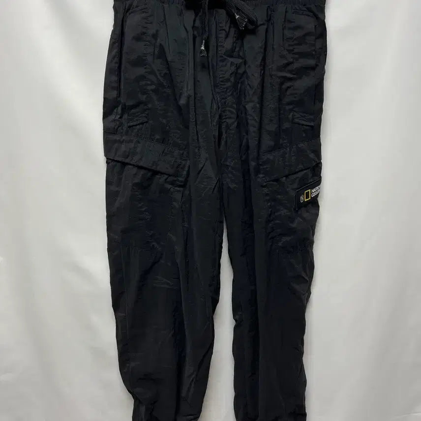 [SOLD OUT] [정품/76] 내셔널지오그래픽 와펜 블랙 우븐 조거 팬츠/바지