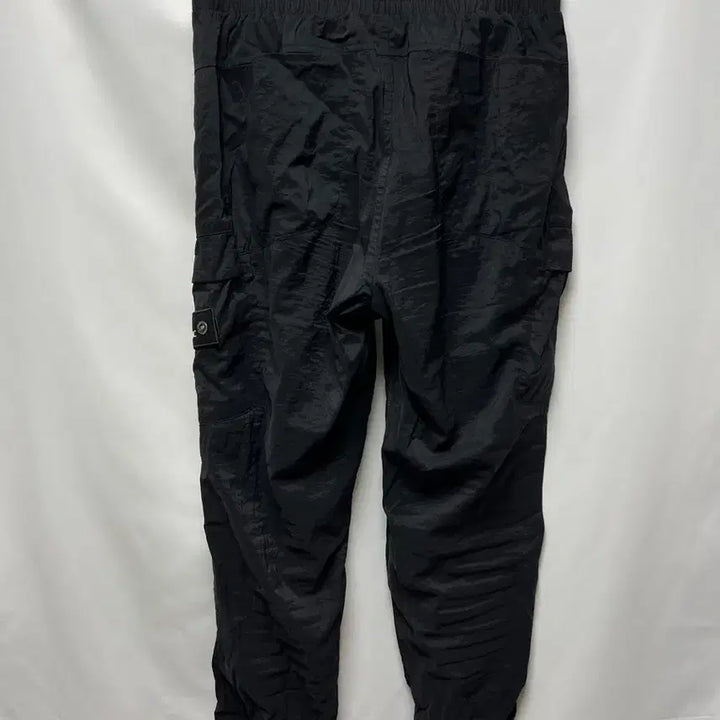 [SOLD OUT] [정품/76] 내셔널지오그래픽 와펜 블랙 우븐 조거 팬츠/바지