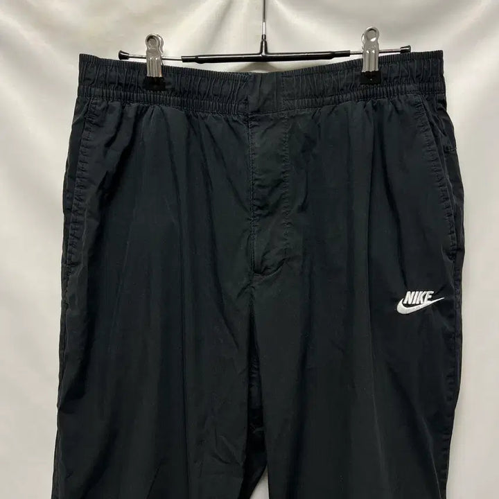 [SOLD OUT] [정품/L] 나이키 스우시 우븐 블랙 카고 팬츠/바지