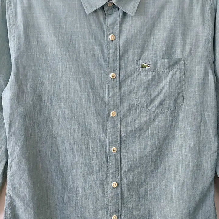 [SOLD OUT] 라코스테 L/105 슬림핏 슬럽 포켓 셔츠. MG. A